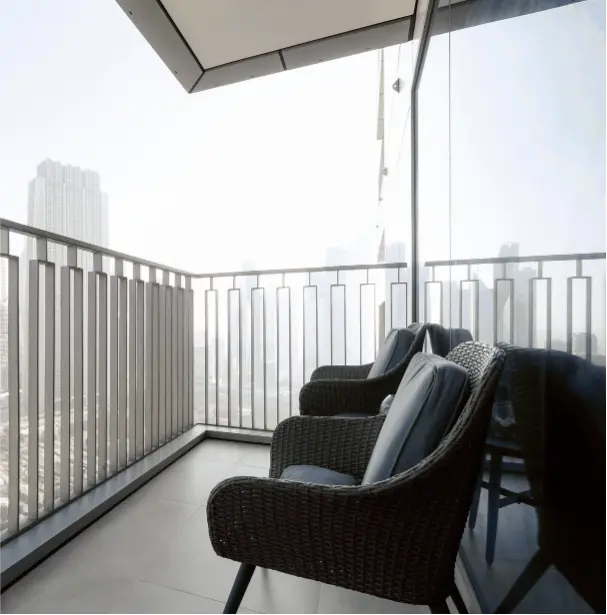 Luxury residence balcony overlooking city skyline by LuxRealty Consulting